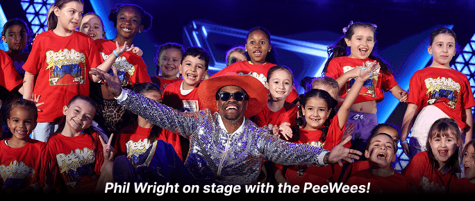 Phil Wright on stage with the PeeWees!